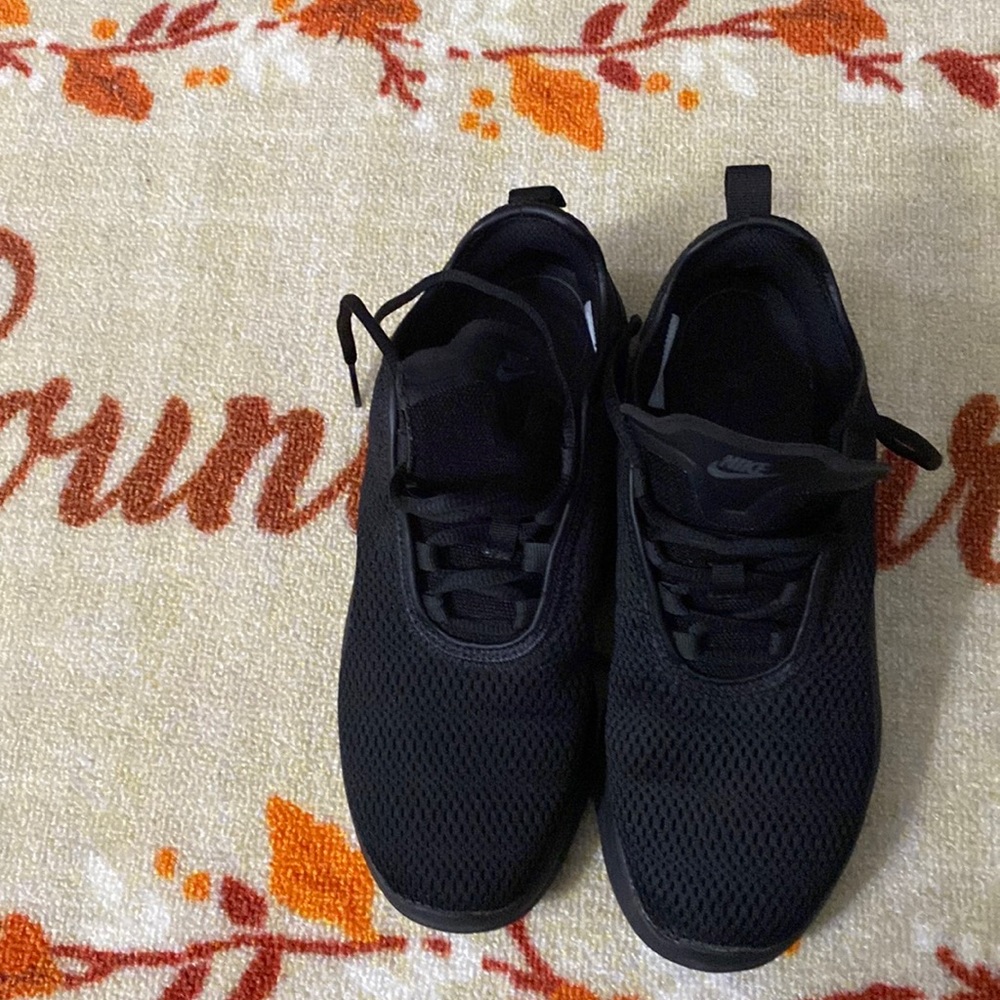 Black mesh Nike sneakers